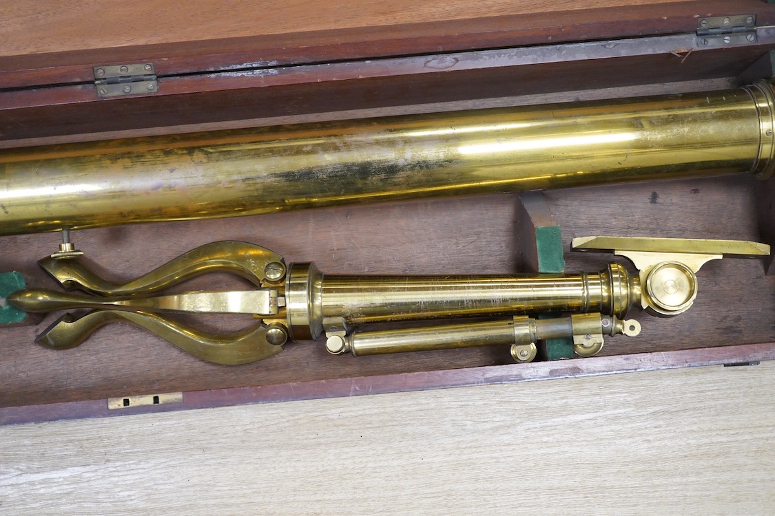A late 19th century brass single drawer refracting telescope by F.L. West, 39 Southampton Street, Strand, London, in a fitted mahogany case, with folding brass tabletop tripod stand, and a number of alternative lenses, t